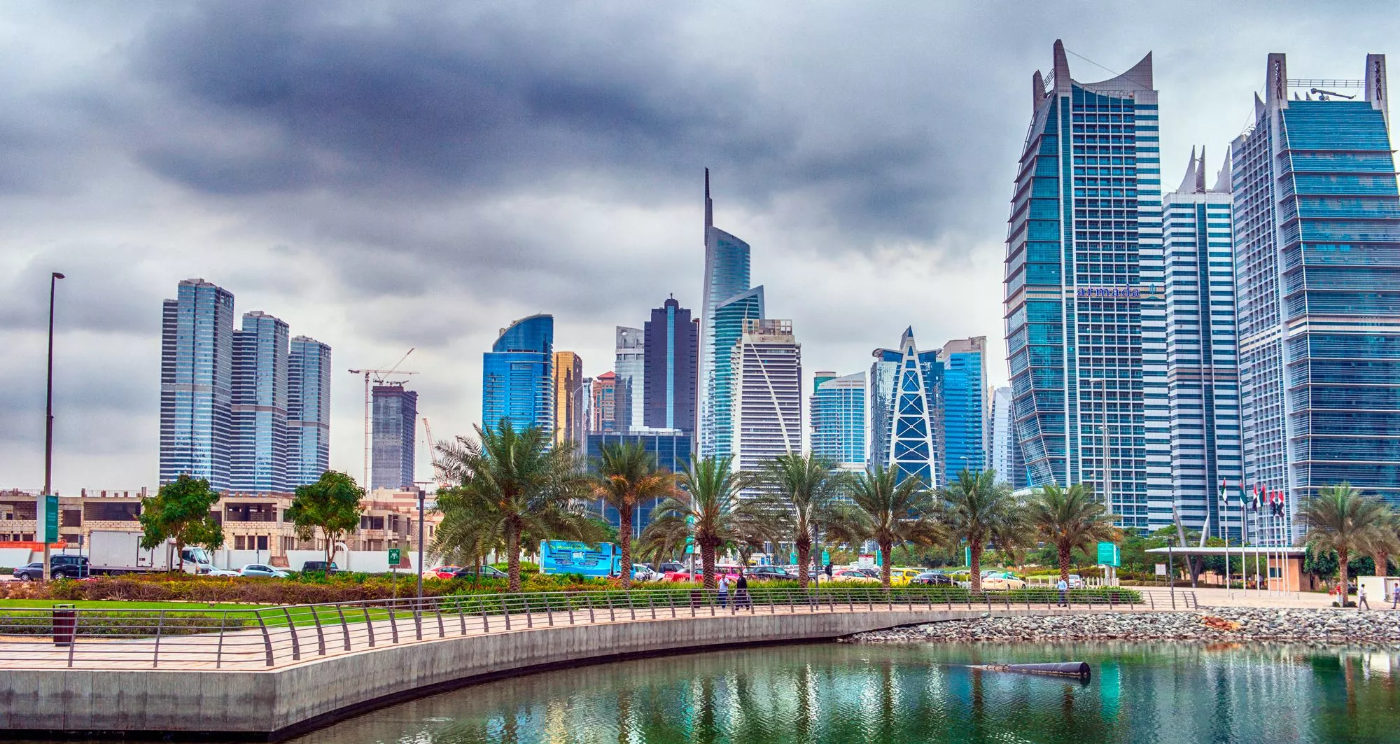 Lush green parks and lakeside walking paths in JLT Dubai